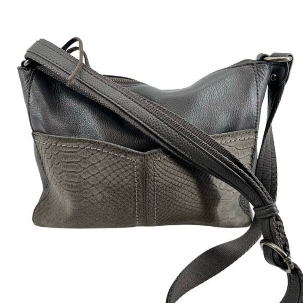 The Sak top zip crossbody bag back zip neutral colors every day travel bag